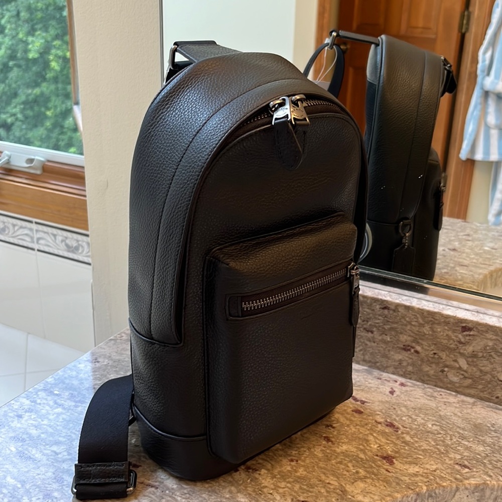 Coach cross body back pack